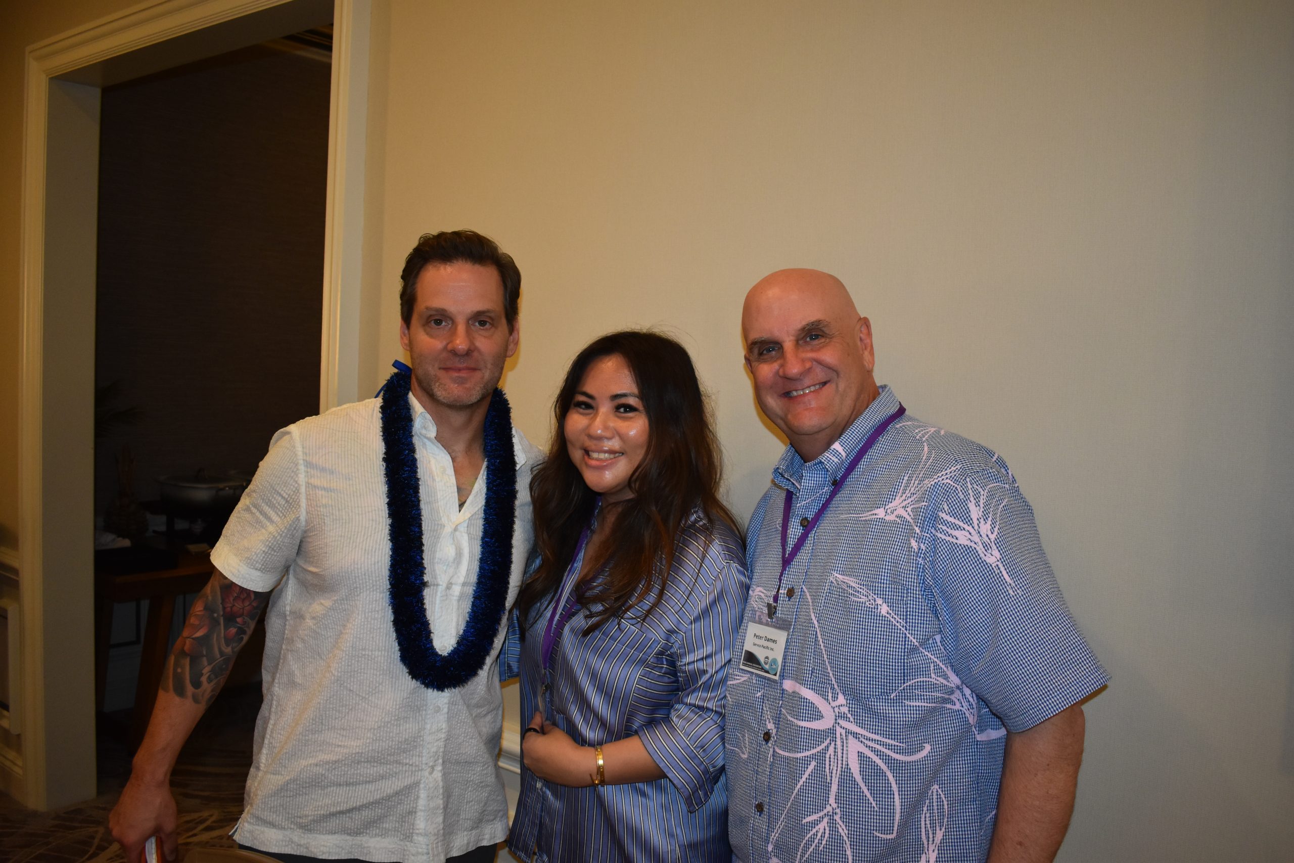 Joseph Langsdale, Angela Wong and Peter Dames pose for a photo after the HADA annual meeting of the Board of Directors